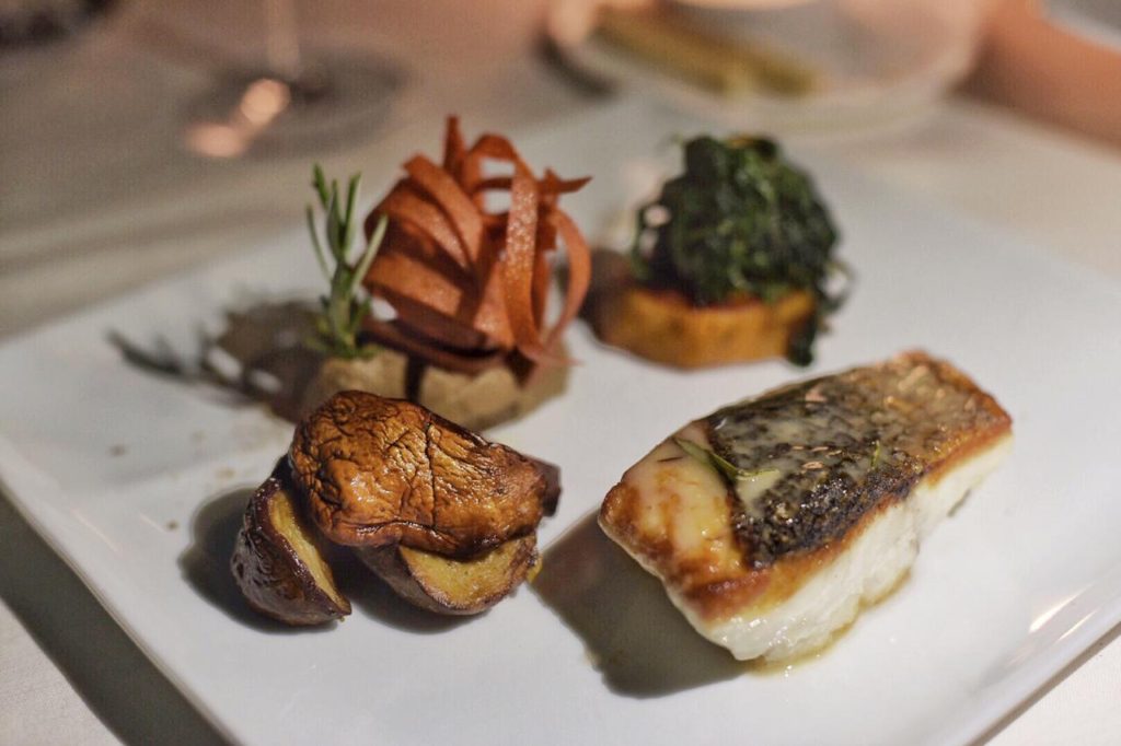 Pan fried seabass with porcini mushrooms, sautéed sweet potatoes and spicy chicory. 